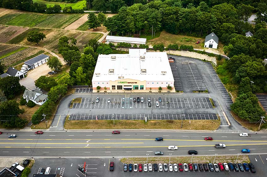 Aerial view of Salem shopping center and its adjacent parking lot, captured from a high vantage point.