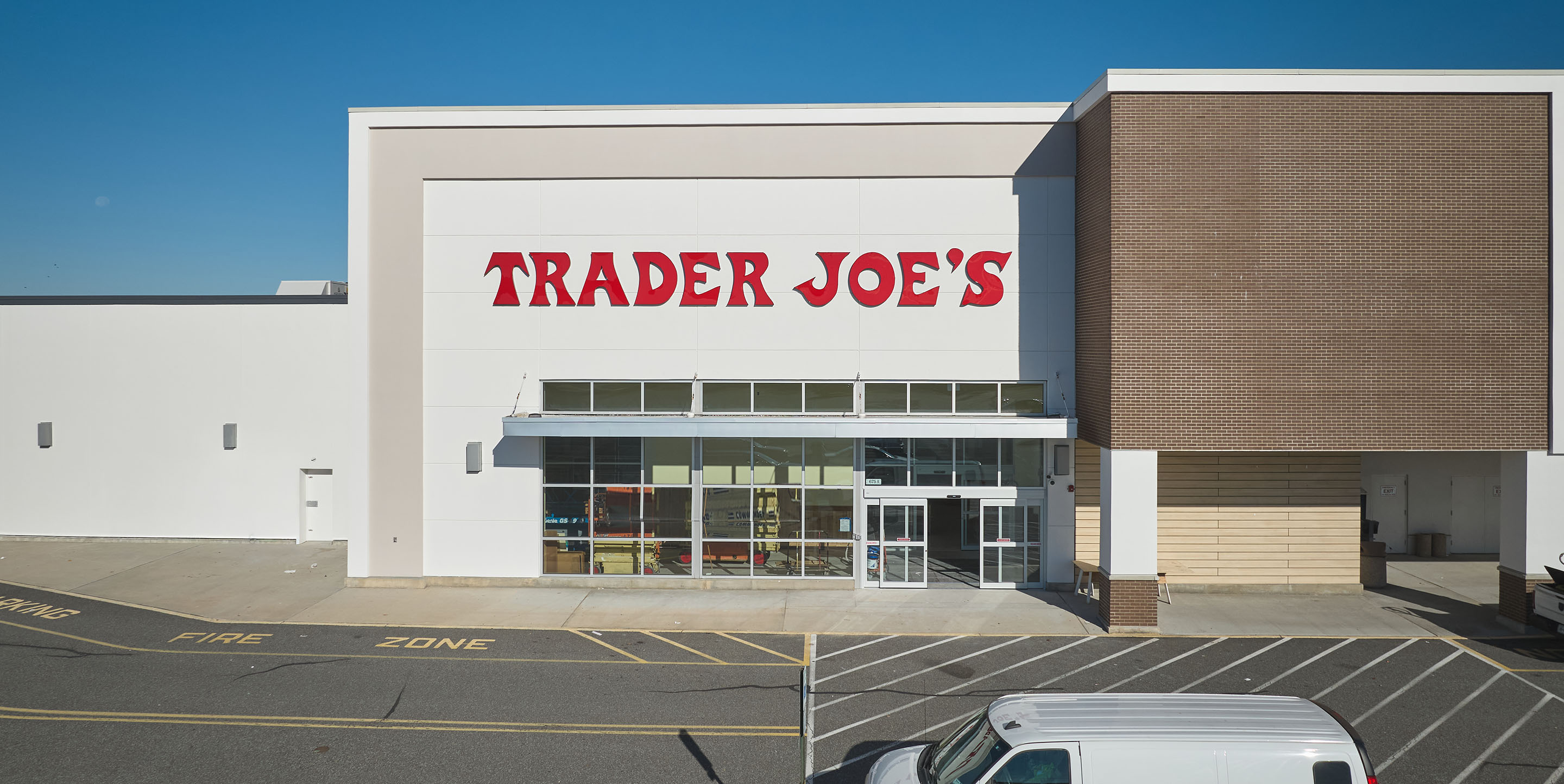Trader Joe's storefront at The Plaza at Woodbridge shopping center.