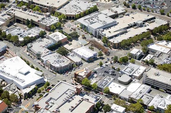 Aerial view of Walnut Creek - Mt. Diablo shopping center and its adjacent parking lot, captured from a high vantage point.